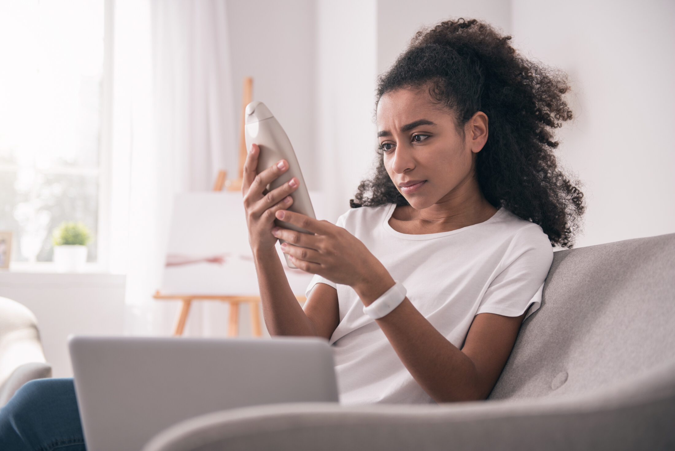 Beauty Consumer At Home Reviwing Product Label Concerned Adobe Stock 203052567