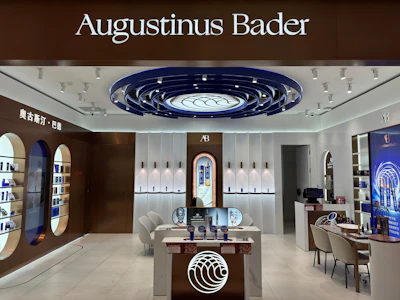 Augustinus Bader luxury skincare store with blue and white interior design