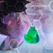 Woman Scientist In Lab Sample Digital Molecule Adobe Stock 178319130