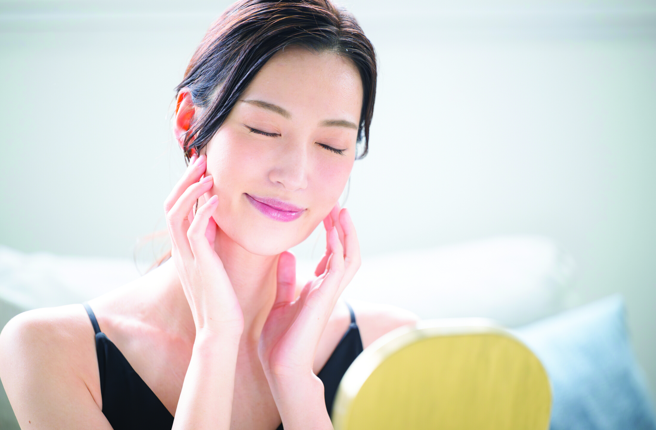 Jd Jojoba Beautiful Young Woman Relaxed Feeling Her Face Mirror Adobe Stock 1014461013