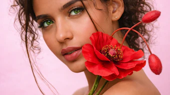 Rona Care Poppy Se Woman Holding Flower Curly Hair