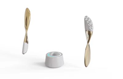The Contour Roller Applicator is a facial massage tool that integrates red light therapy, vibration and cooling metal beads.