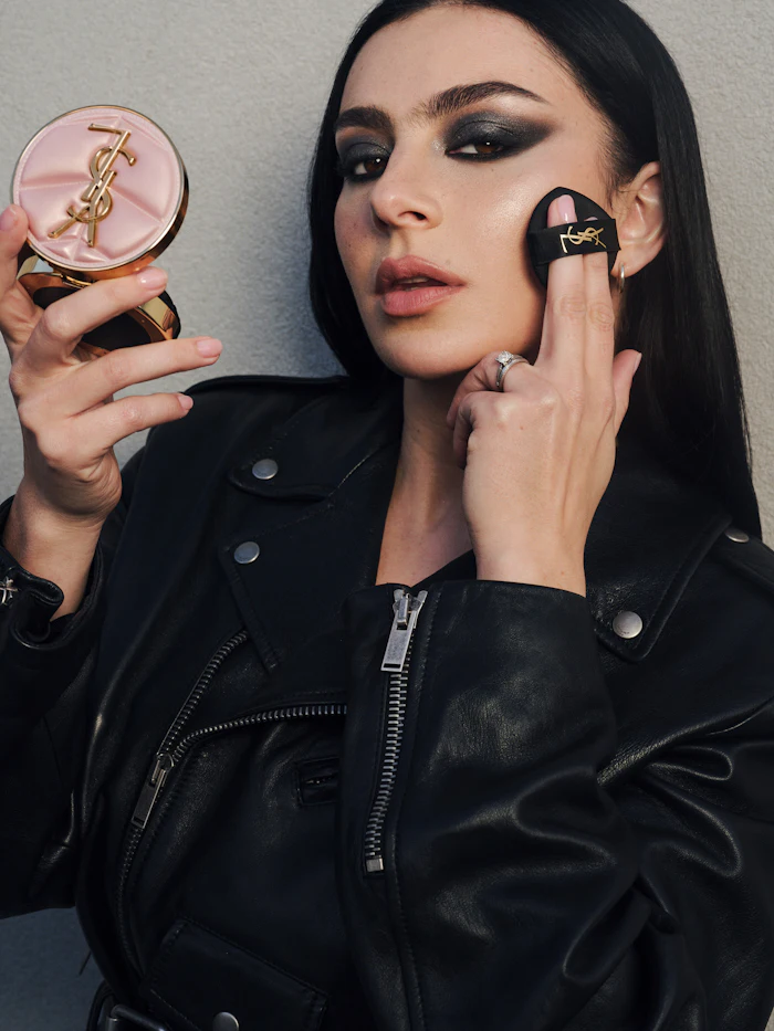 Prestige makeup sales rose just 3%, while unit demand softened slightly. The category is therefore generating modest dollar growth without expanding its unit base. Yet pockets of the category are thriving: bronzer and blush posted double-digit gains. Pictured is Charli XCX with YSL Beauty's powder-based Make Me Blush.