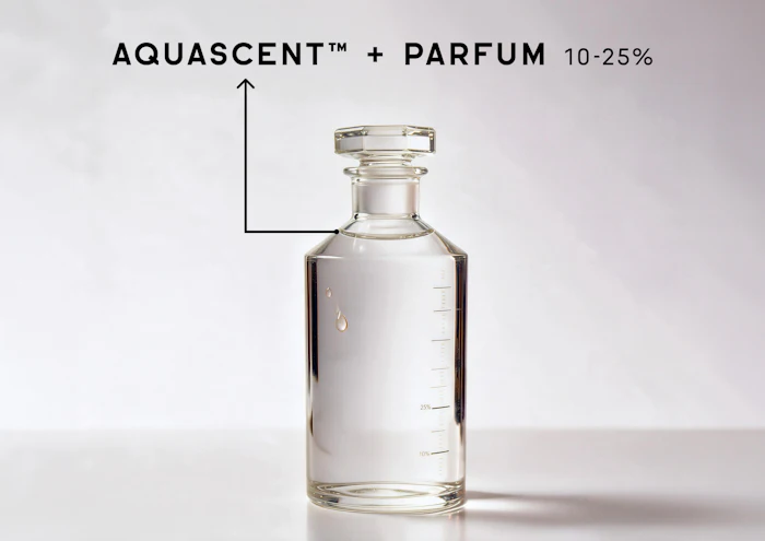 Clear glass perfume bottle labeled Aquascent with Parfum 10-25% concentration on white background