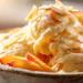 Creamy dessert topped with whipped cream, fresh peach slices, and toasted almond flakes on a ceramic plate