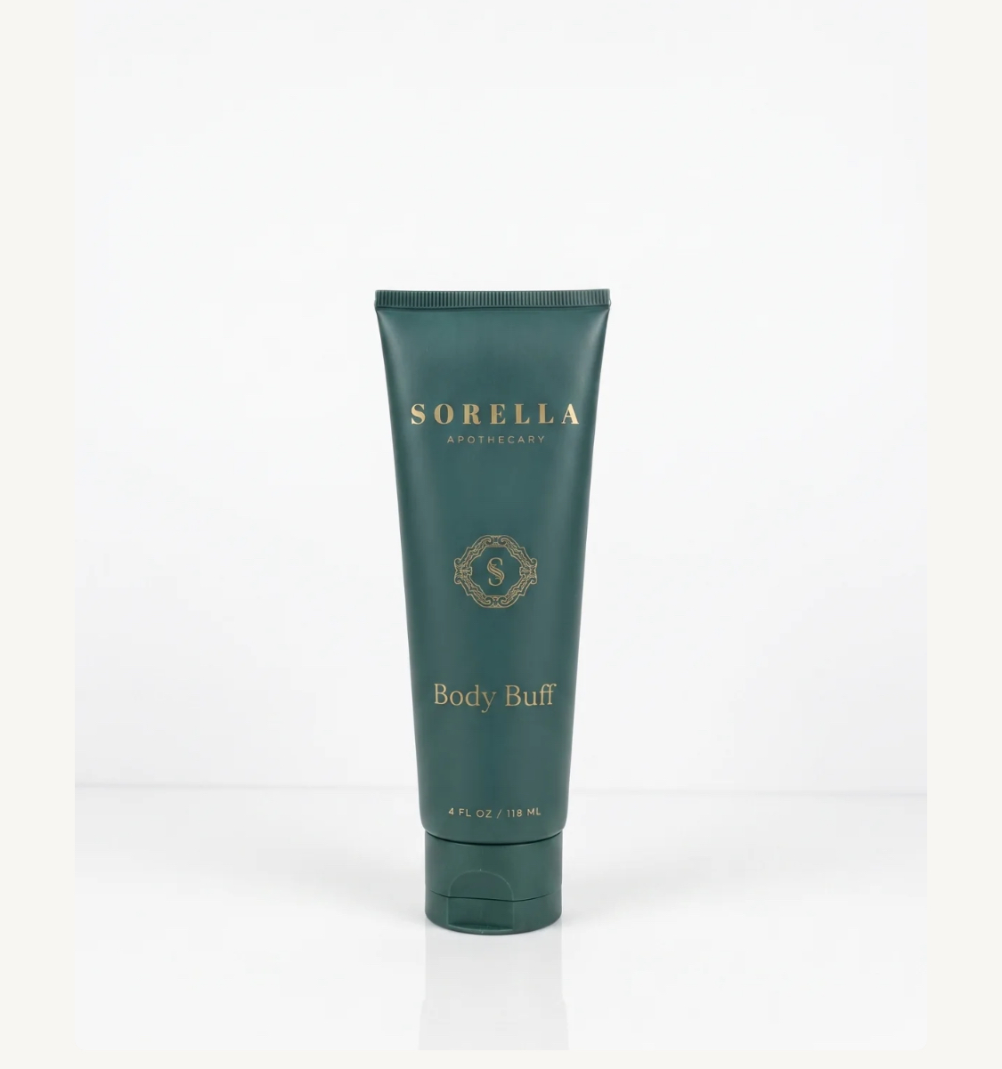Sorella Apothecary Body Buff exfoliating skincare product in teal tube with gold lettering, 4 fl oz