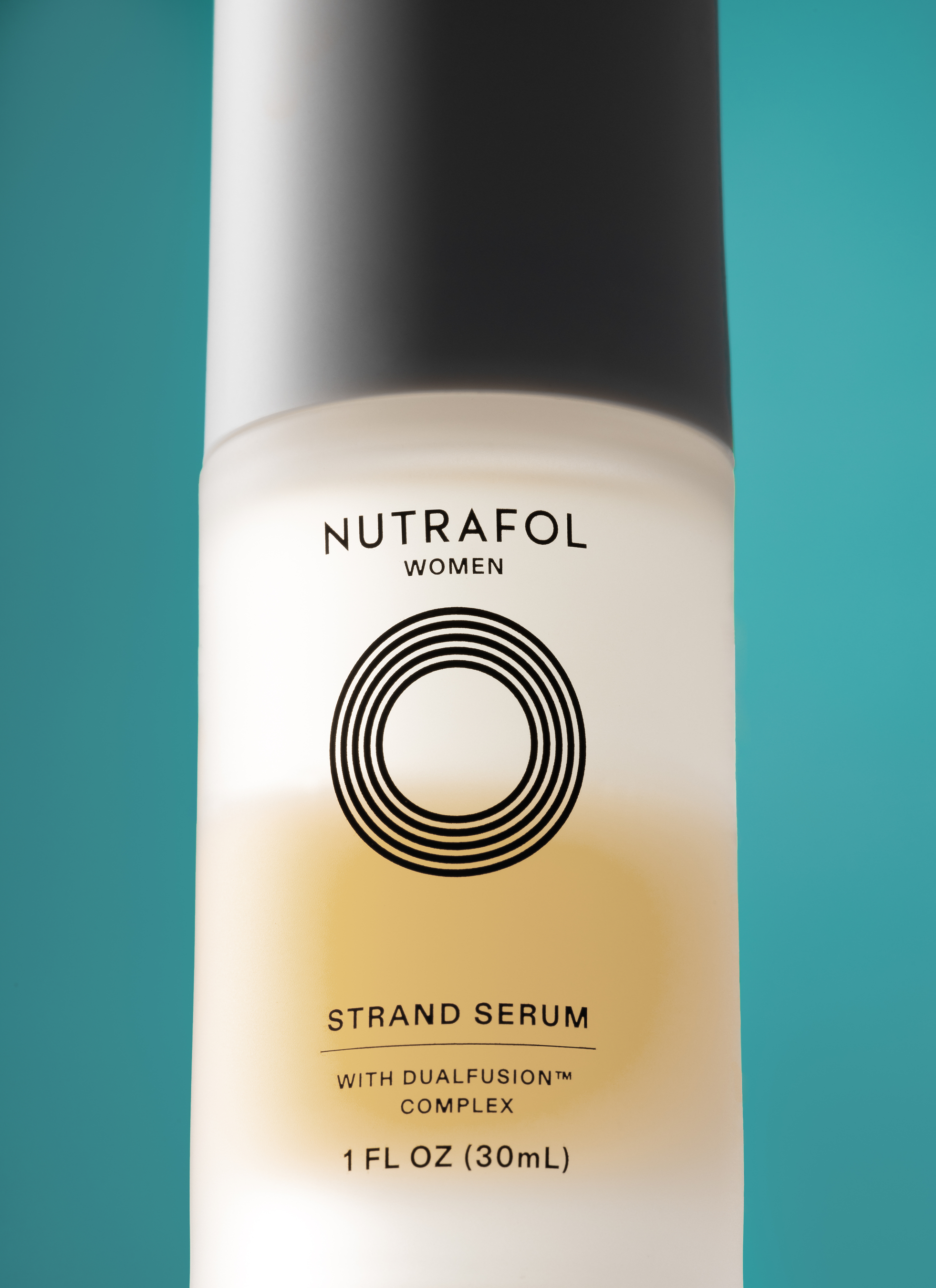 Nutrafol Women Strand Serum bottle with DualFusion Complex, 30mL, displayed against teal background