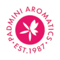 Padmini Aromatics logo featuring a white four-petaled flower in a magenta circle with circular text established 1987