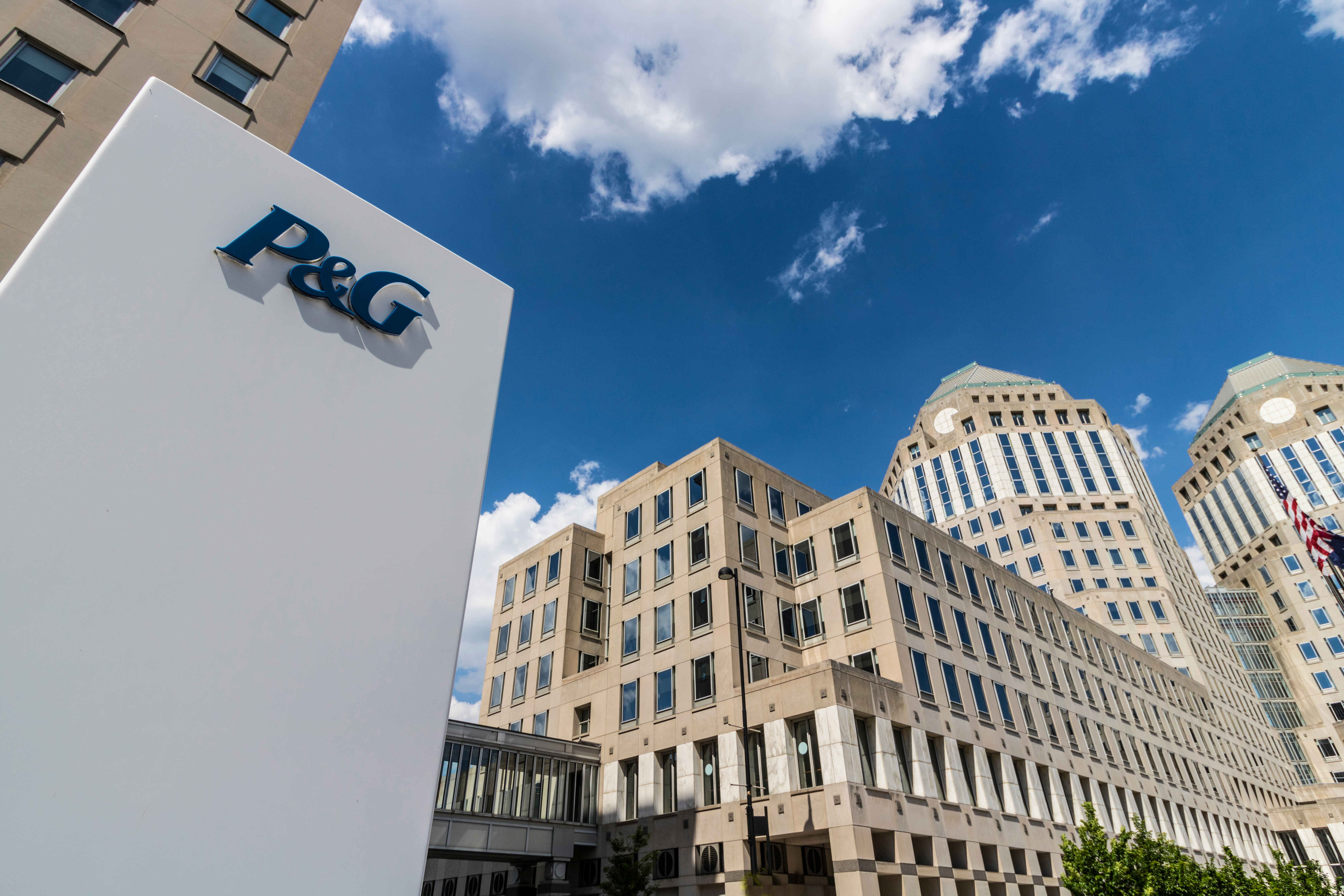 P&G corporate headquarters building with blue sky and downtown architecture