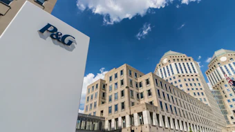 P&G corporate headquarters building with blue sky and downtown architecture